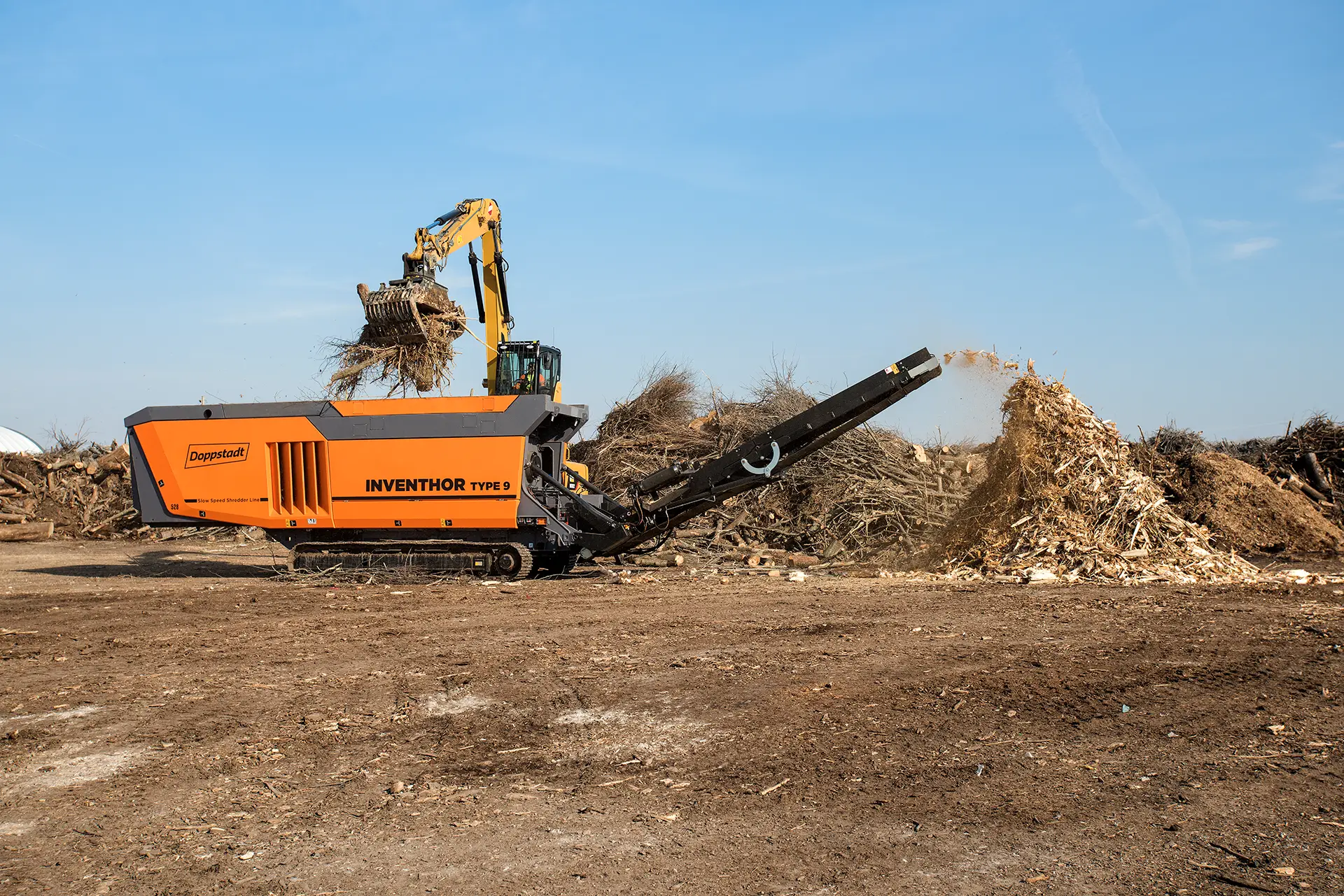 A Doppstadt high-torque shredder reduces green waste into small pieces to make mulch or compost.