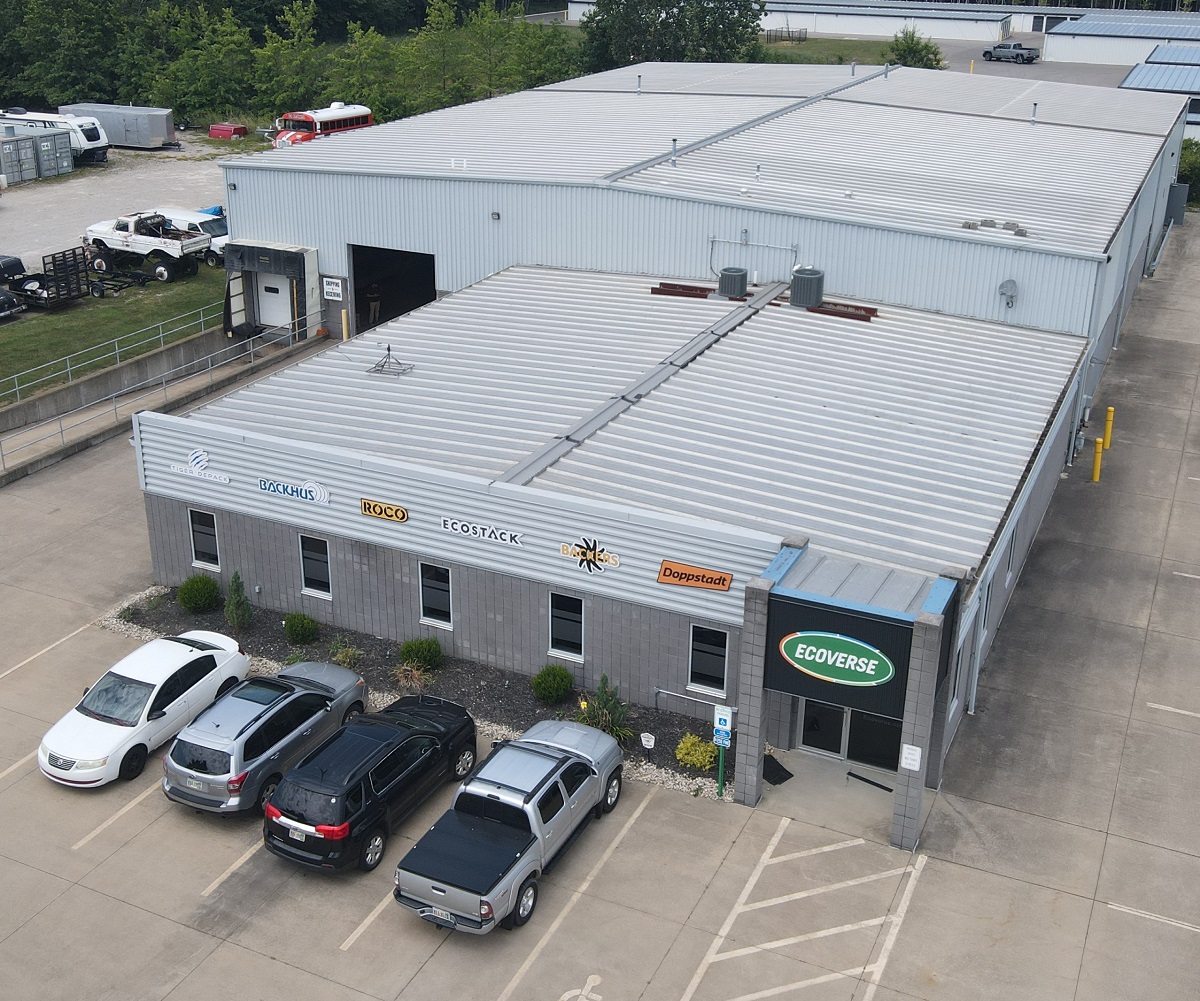 A aerial drone photo of the Ecoverse Support Center, showing the office space in front with teh warehouse space behind.
