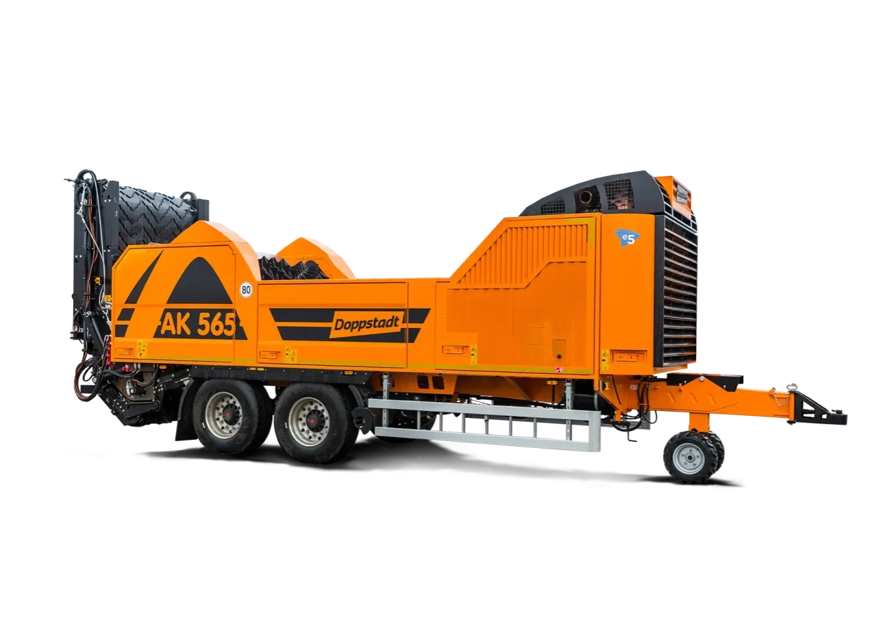 A cut-out image of a wheeled Doppstadt AK 565 grinder shows it in transport position.