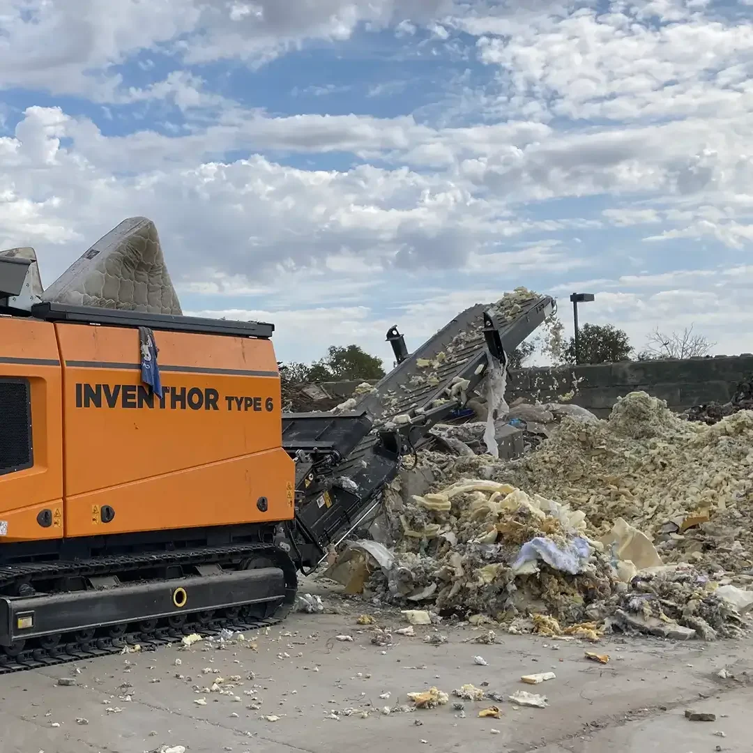 recycling mattresses begins with a high-torque shredder separating their components.